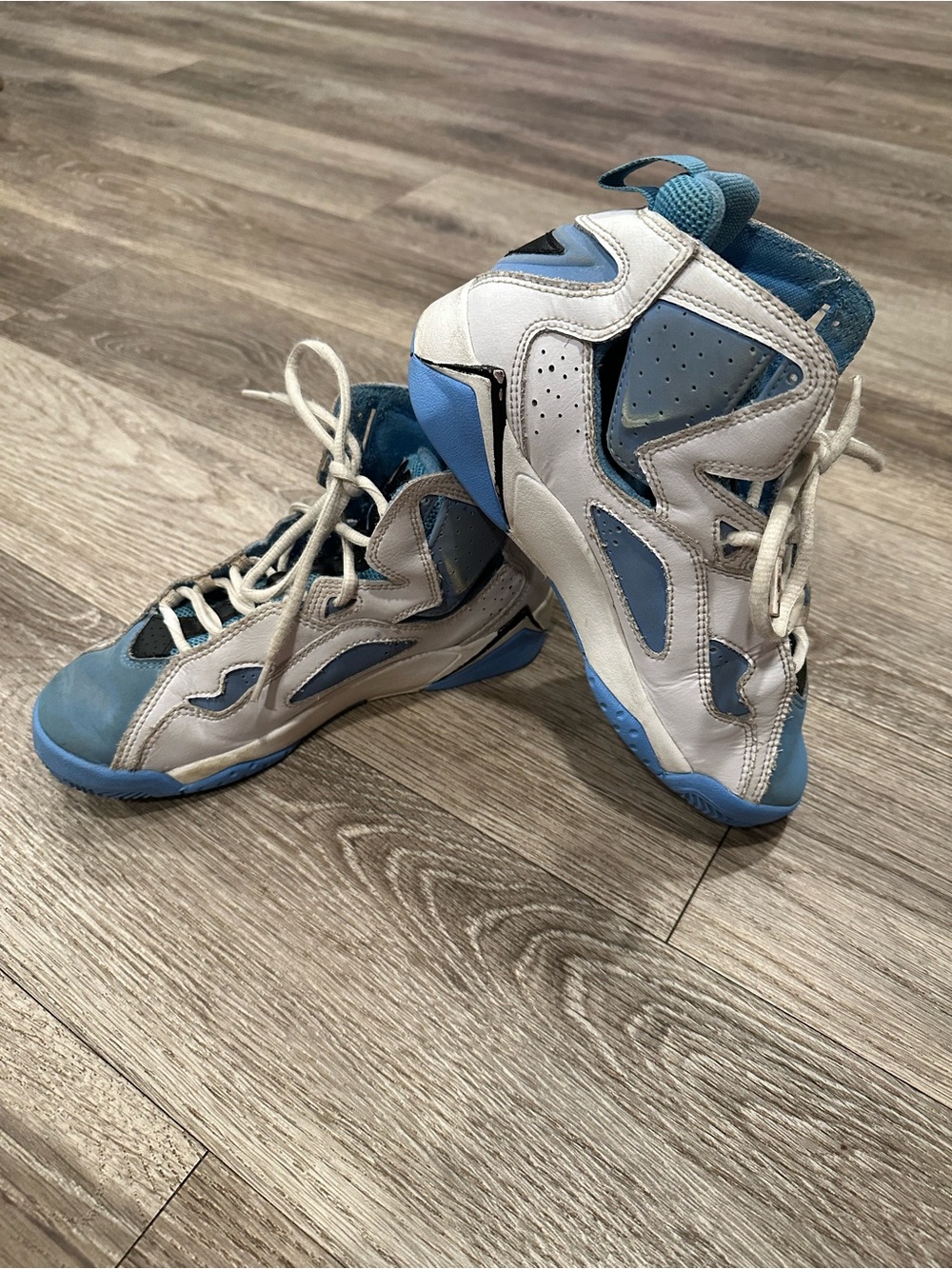 Nike Kids High-Top Air Jordan Sneakers in White and Light Blue